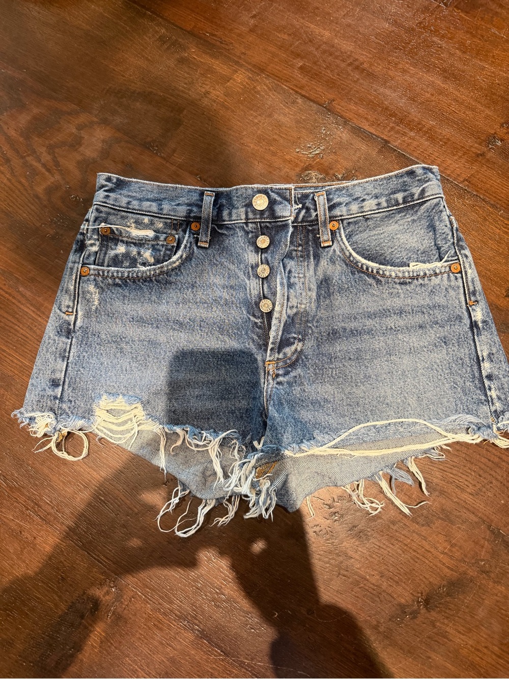 Agolde Light Blue Button-Front Distressed Denim Shorts
